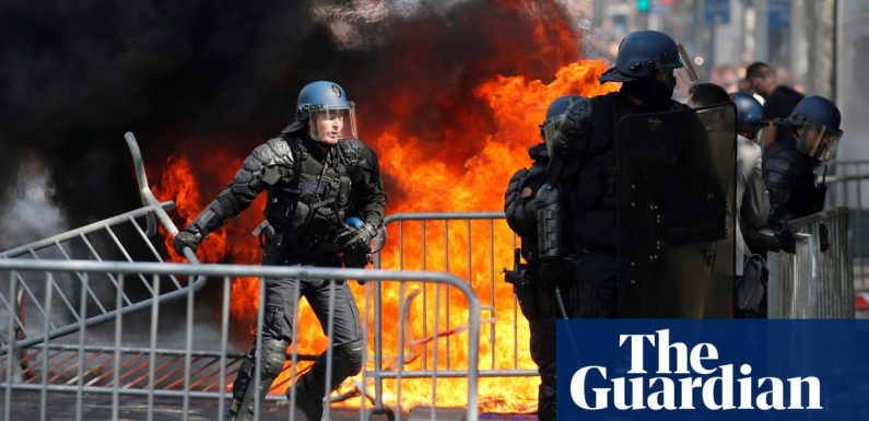 France: riot police use teargas to disperse Bastille Day protesters