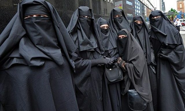 Dutch ban on burqas in public places takes effect