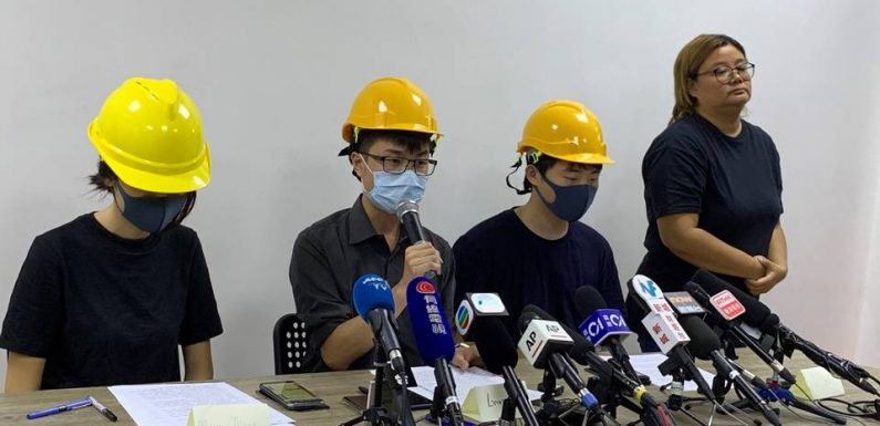 Hong Kong: Des manifestants masqués devant la presse pour contrer la communication officielle