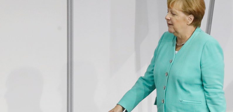 Merkel promises to meet defense spending target amid U.S. criticism