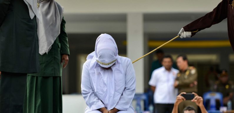 Indonesian man flogged for adultery under law his organisation helped draft