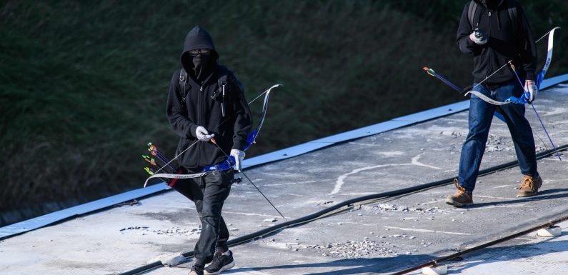 Watch: Protesters use catapults to hold off police advance