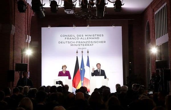 Merkel and Macron Publicly Clash Over NATO