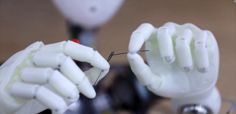 These dog-like robots do backflips and play soccer. Yes, they’re adorable