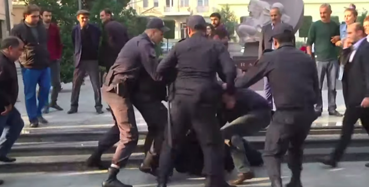 How does Facebook explain the disappearance of police violence videos in Azerbaijan?