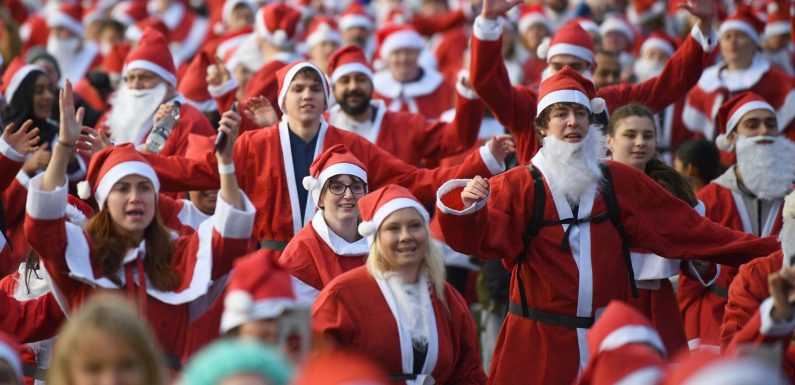 Thousands take part in biggest ever Santa Run in London