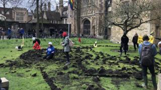 Cambridge’s Trinity College lawn dug up by Extinction Rebellion