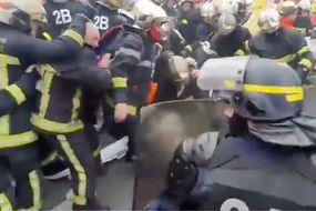 Emmanuel Macron desperation: Riot police caught battering protestors fleeing in terror